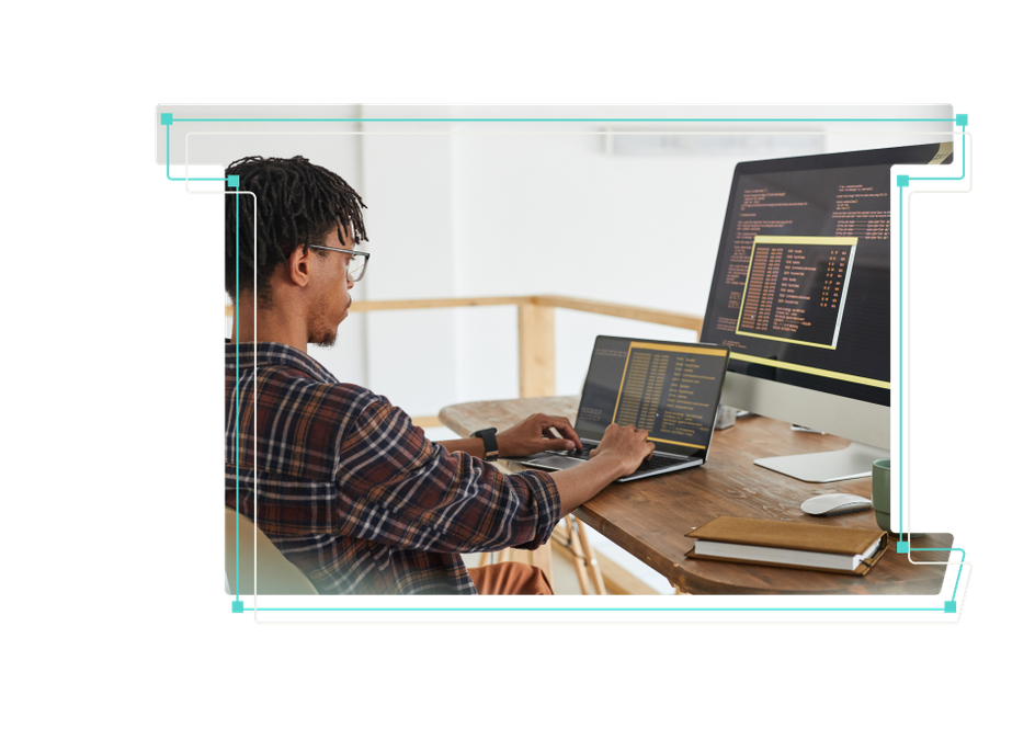 A stylized line art rendering an upside down number 1 with person working on laptop in frame.