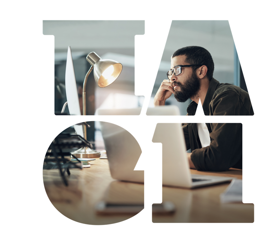 A woman using a computer masked by expanded T A G 1 characters.