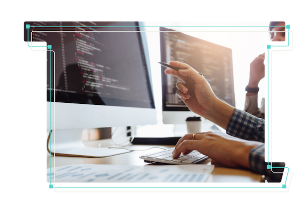 A stylized line art rendering letter T with image of monitor and hands working.